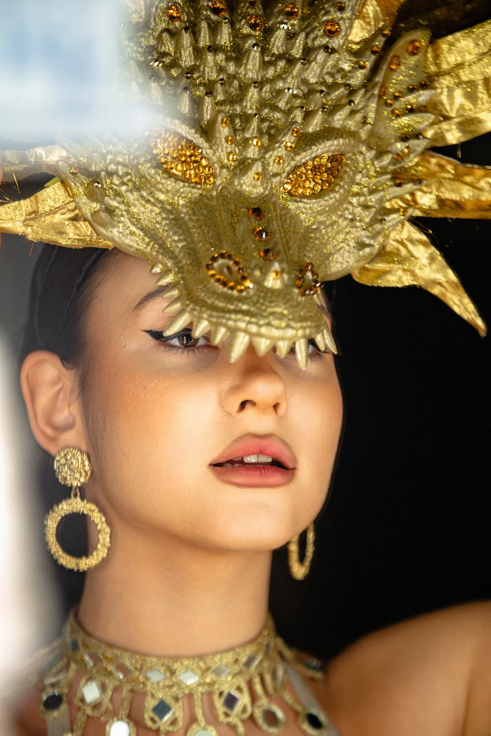Golden headdress closeup at mirror