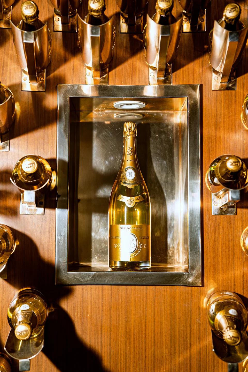 Champagne bottle centered gold display