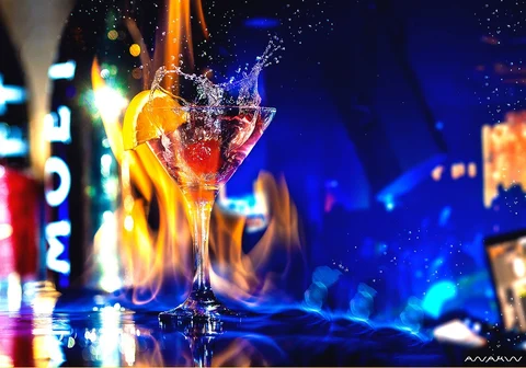 Cocktail splash fire blue light