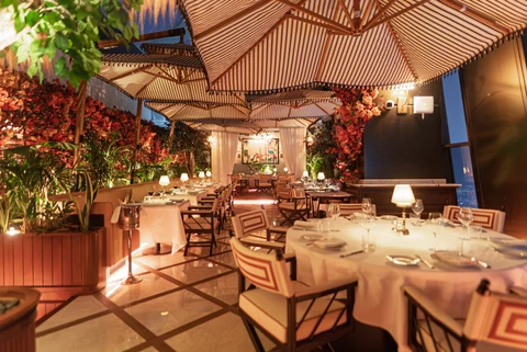 Restaurant striped canopies floral walls