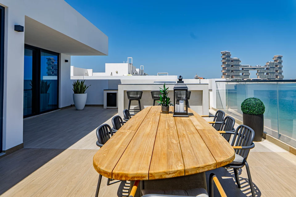 Wood table waterfront rooftop