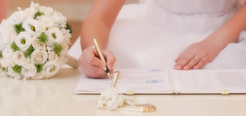 Wedding signing hands detail